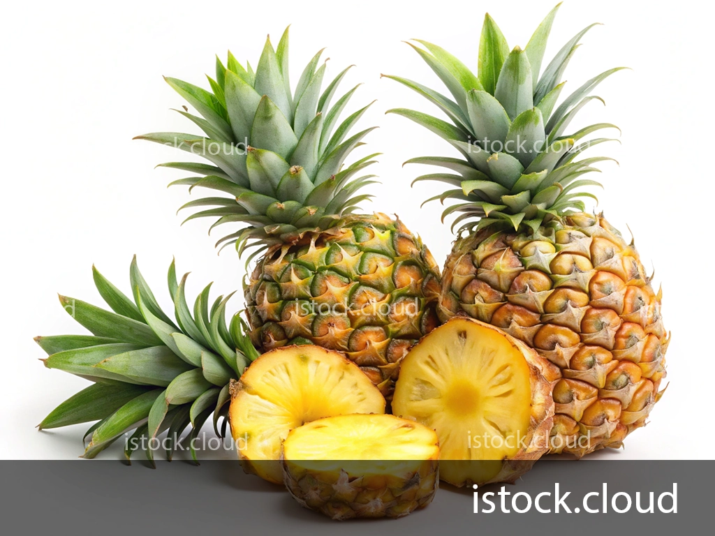 Three ripe pineapples with green foliage alongside one freshly cut pineapple slice, showcasing their juicy yellow interior.
