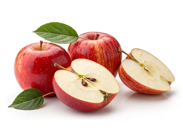 Four fresh red apples, two whole and two halved, with green leaves, displaying their juicy insides and seeds.