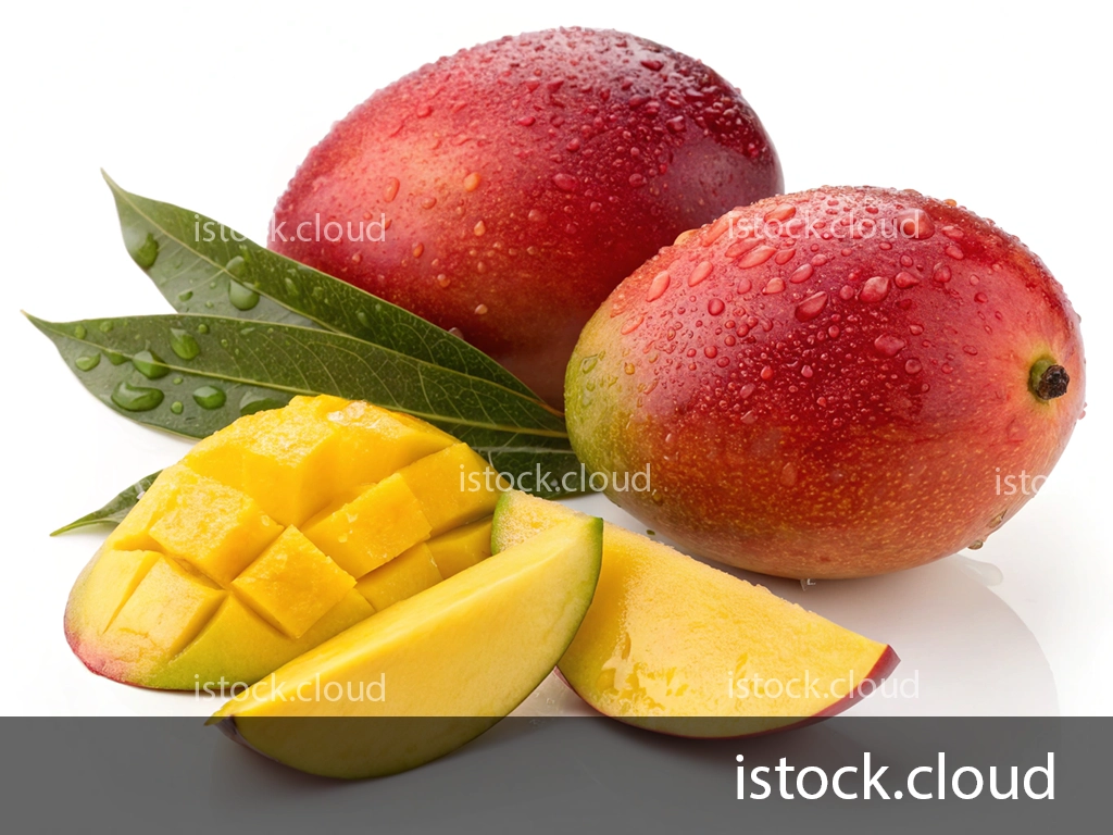 Two fresh whole mangoes, and one sliced to reveal the bright yellow fruit, with droplets of water on their surfaces and green mango leaves in the background.